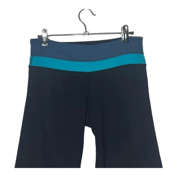 1938. LULULEMON GROOVE CROP LEGGINGS BLACK/NAVY BLUE/TEAL COLOR SEE MEASUREMENTS - Picture 2 of 7